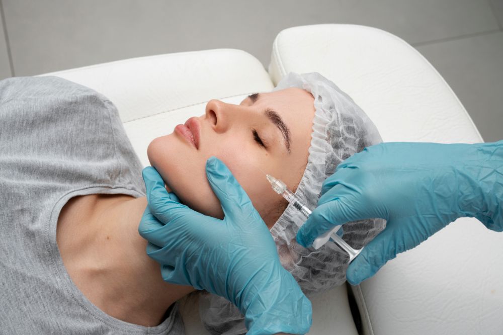 a woman is getiing cosmetic botx treatement